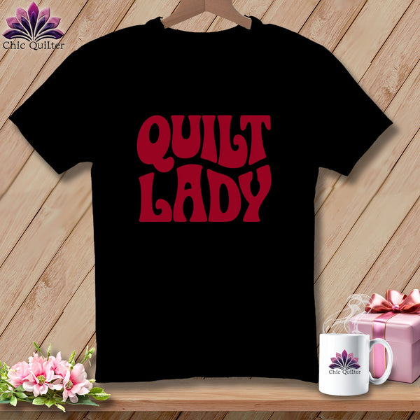 Black t-shirt with red "Quilt Lady" text. Chic Quilter logo on mug.