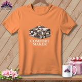 Orange t-shirt with folded quilt graphic and text 