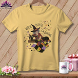 Yellow t-shirt with a witch sewing a quilt, 