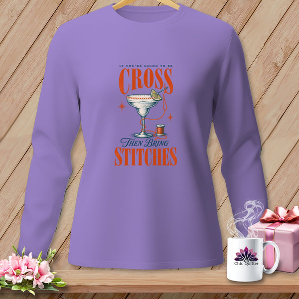 Purple long-sleeve shirt with graphic saying "If you're going to be cross then bring stitches."