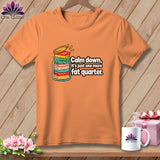 Orange t-shirt featuring a graphic of a jar full of folded fabric with text reading 