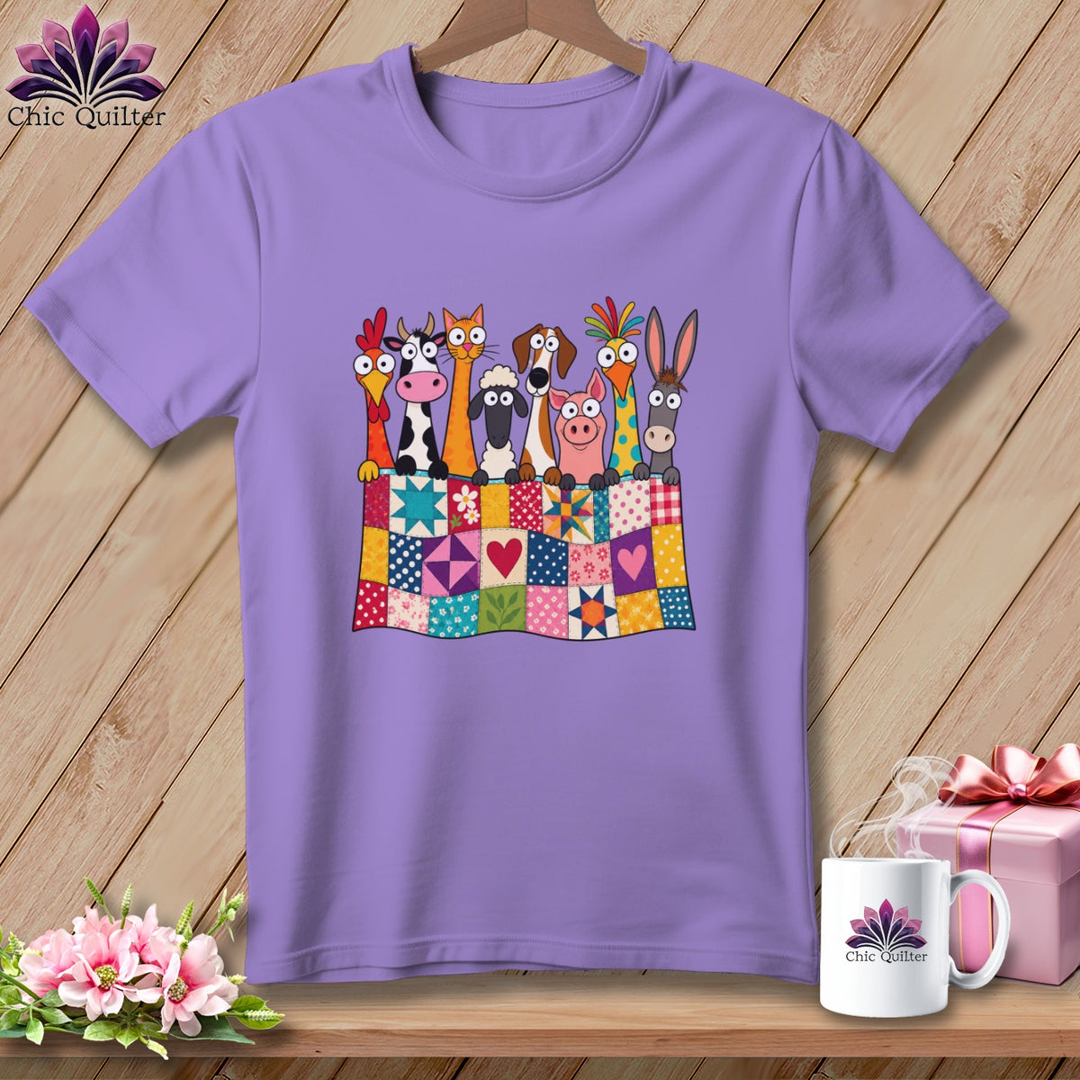 Purple t-shirt featuring a graphic of cartoon farm animals peeking over a colorful patchwork quilt.