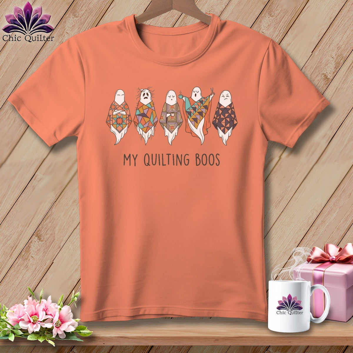 Orange t-shirt with five patterned ghosts and "MY QUILTING BOOS" text.