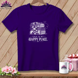 Purple t-shirt with a stack of quilts and 