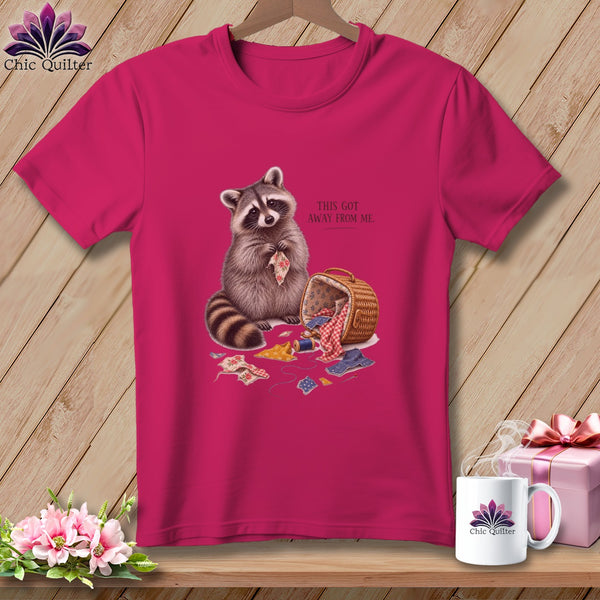 T-shirt with raccoon and sewing supplies, text reads "This Got Away From Me."