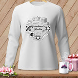 White long-sleeve shirt with sewing-themed graphics and 
