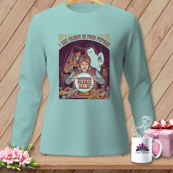 Fortune teller with ghost predicts "ENORMOUS FABRIC SALE!" on shirt.