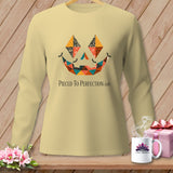 Light yellow long-sleeve shirt with patchwork jack-o'-lantern face and text.