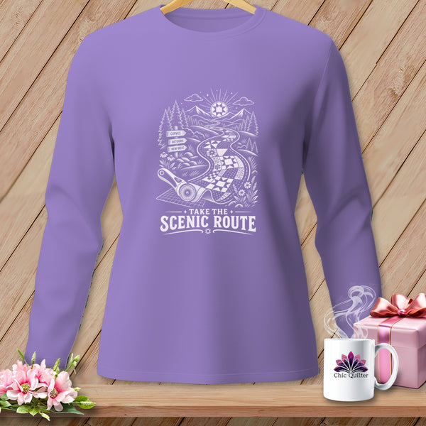 Lavender long-sleeve shirt with "Take the Scenic Route" graphic and quilting motifs.