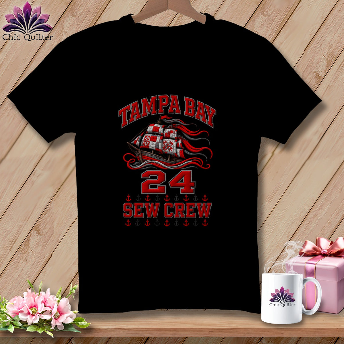 A black t-shirt featuring a red pirate ship graphic with Tampa Bay 24 Sew Crew text.
