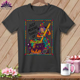 Graphic t-shirt with witch mixing cauldron and text 