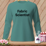 Teal long-sleeve shirt with black text 