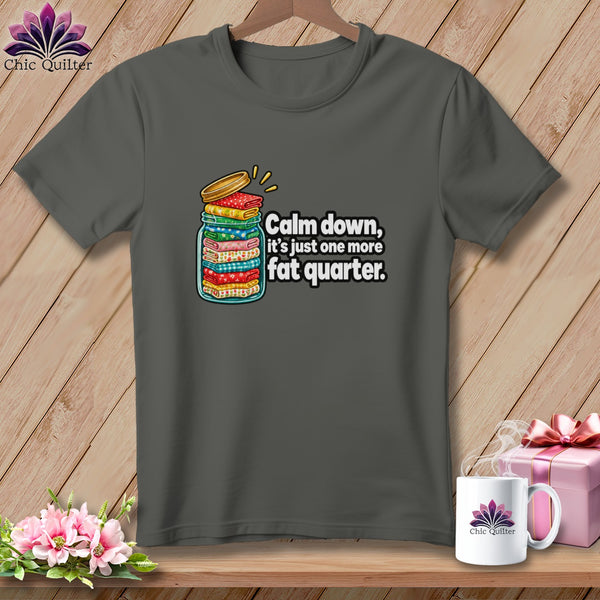 Dark gray t-shirt featuring a mason jar filled with fabric stacks and the text, Calm down, it's just one more fat quarter.