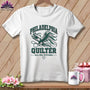White t-shirt featuring a green graphic of an eagle holding a needle, with text reading Philadelphia Quilter All-Pro Stitcher.