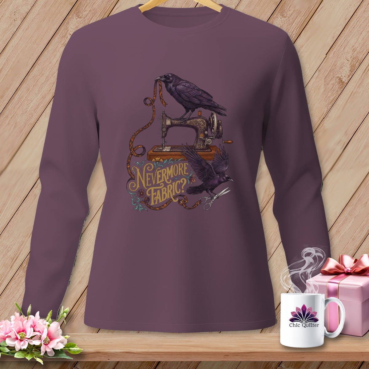 Long-sleeve shirt with ravens, sewing machine, and "Nevermore Fabric?" text.