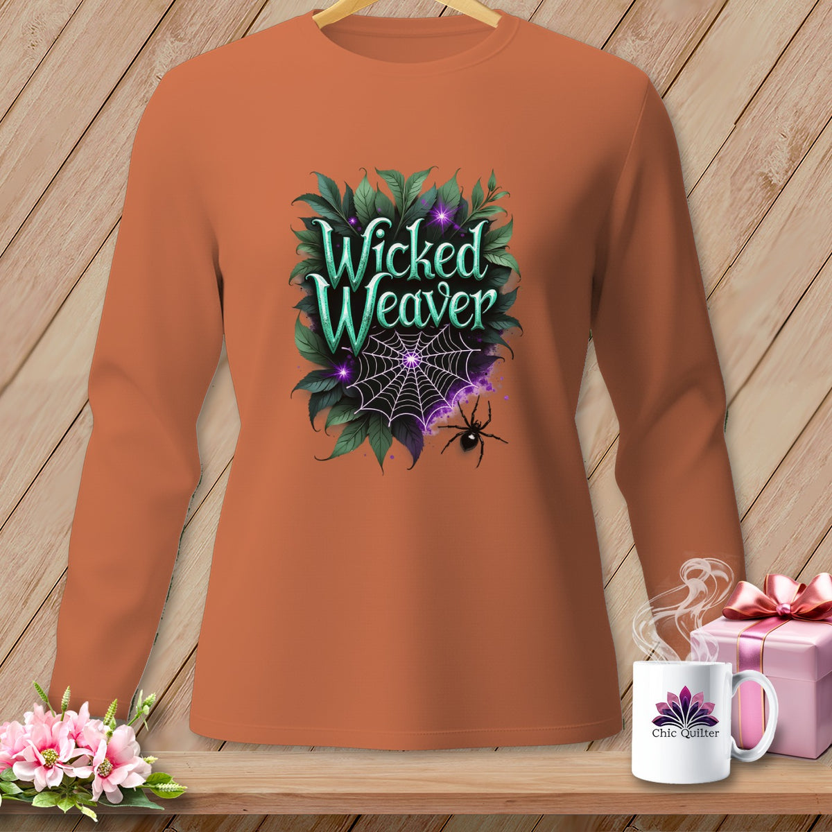 Long-sleeve orange shirt with "Wicked Weaver" text, spider web, and spider graphic.