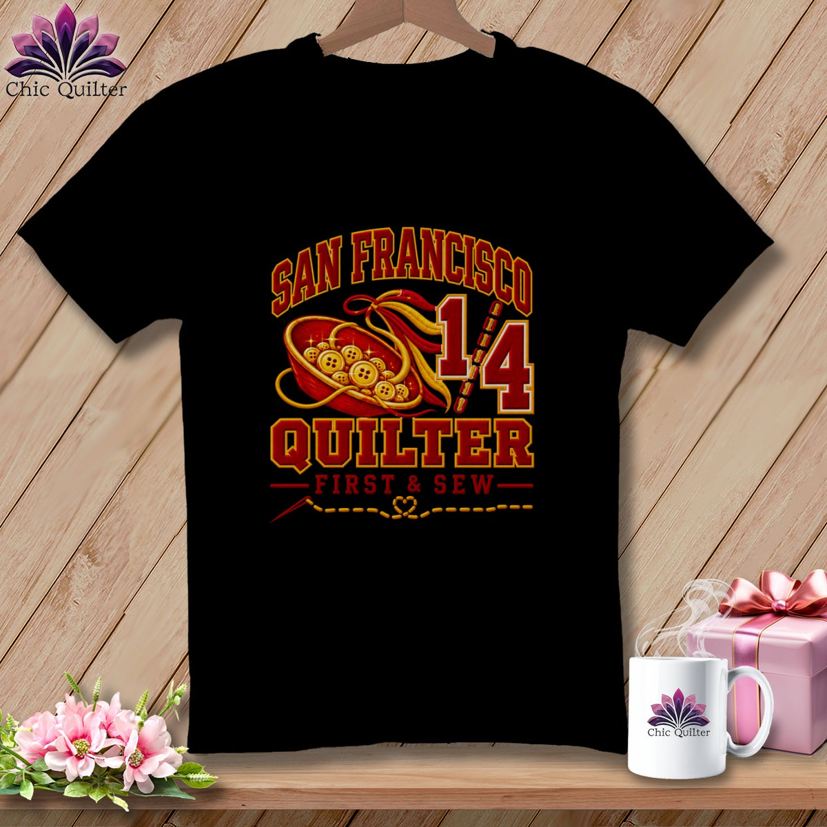 A black t-shirt features a San Francisco Quilter graphic with a bowl of buttons and sewing motifs.