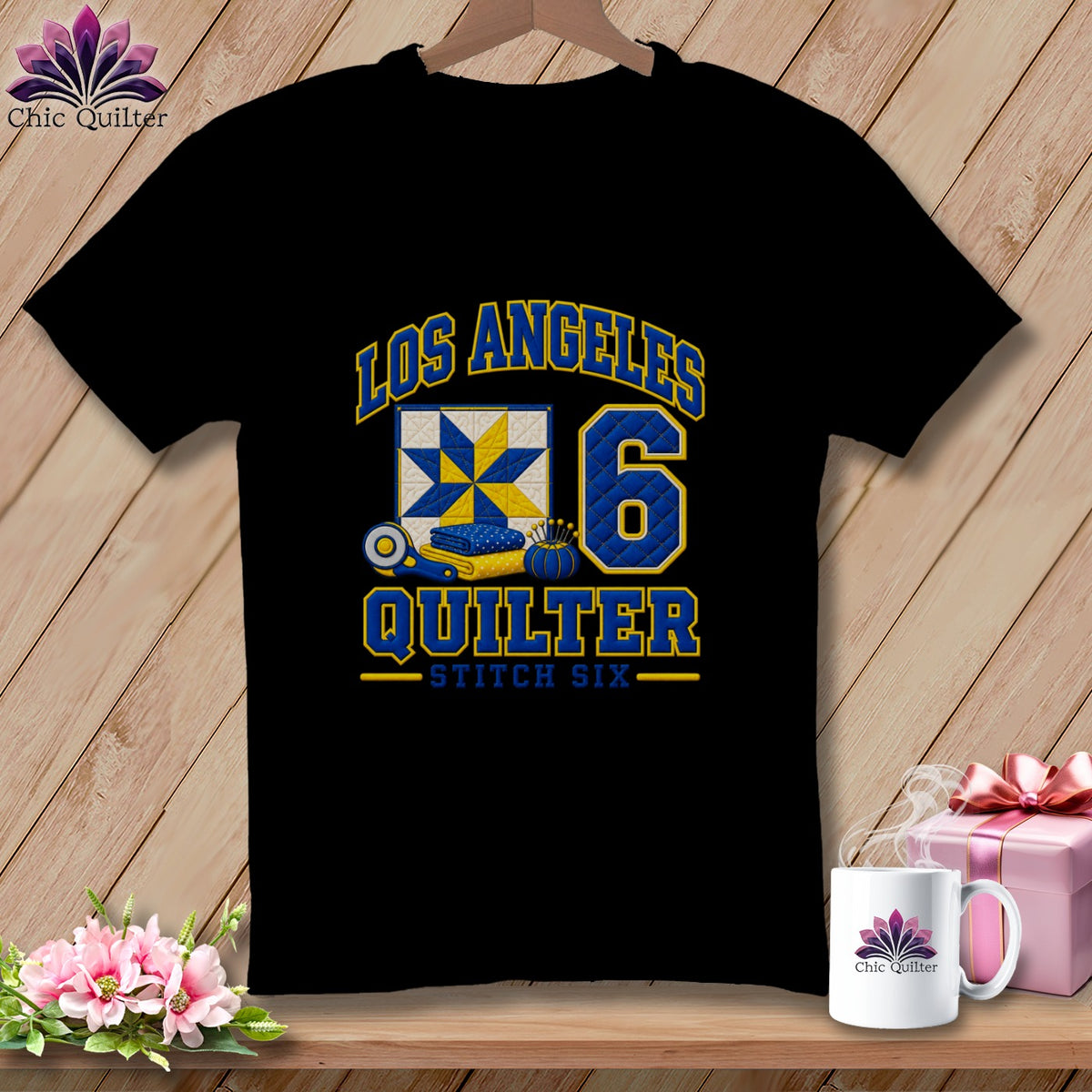 Black t-shirt featuring Los Angeles Quilter text, a blue and yellow quilt graphic, and the number six.