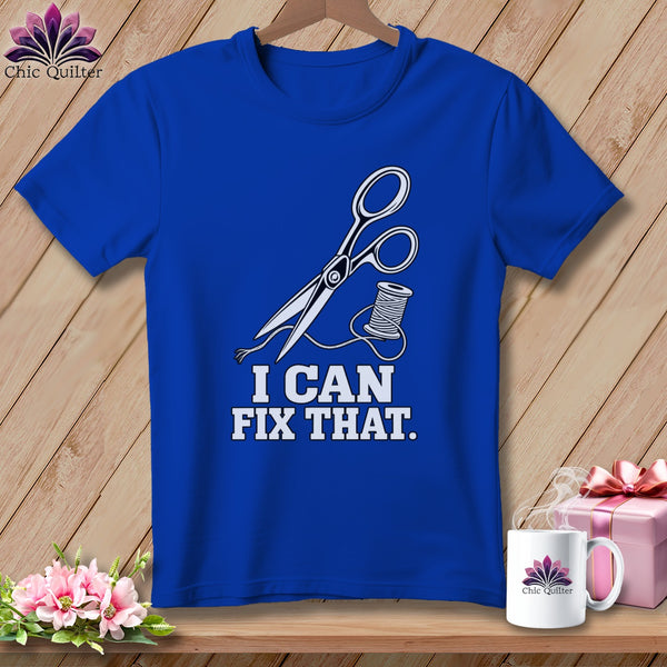 Royal blue t-shirt with scissors, thread, and "I CAN FIX THAT." text.