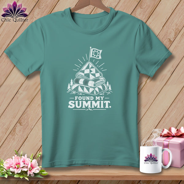 Teal t-shirt with "Found My Summit" text and stacked quilt graphic.