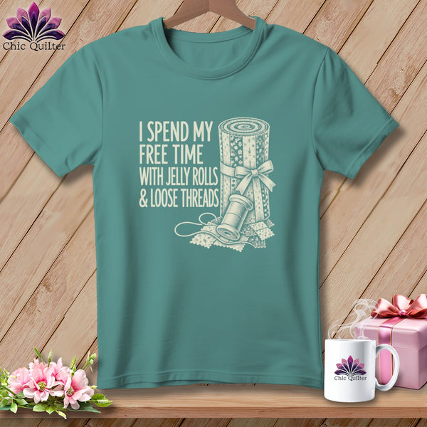 Teal t-shirt with "I spend my free time with jelly rolls & loose threads" text.