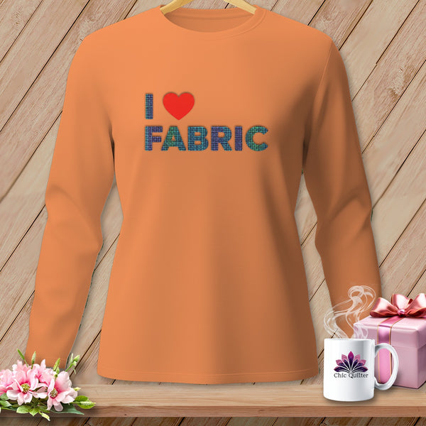 Orange long-sleeve shirt with "I love FABRIC" text and heart design.