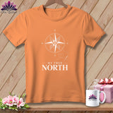 Orange t-shirt with white compass design and text 