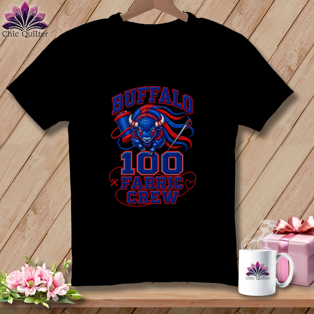 Black short-sleeve t-shirt with a blue and red graphic featuring a buffalo, a spool of thread, and the text "Buffalo 100 Fabric Crew".
