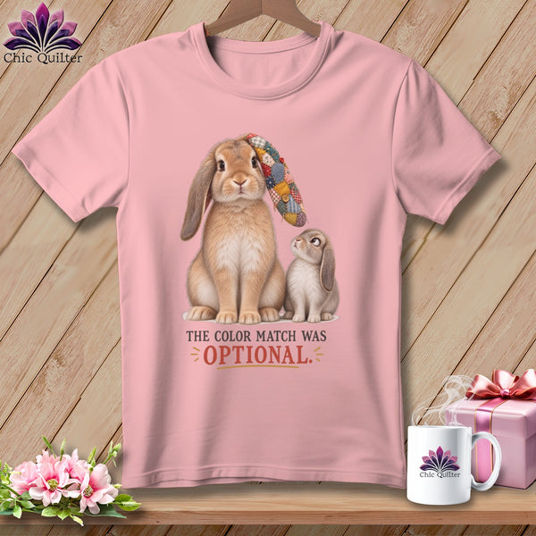 Pink t-shirt with two rabbits and text "THE COLOR MATCH WAS OPTIONAL."
