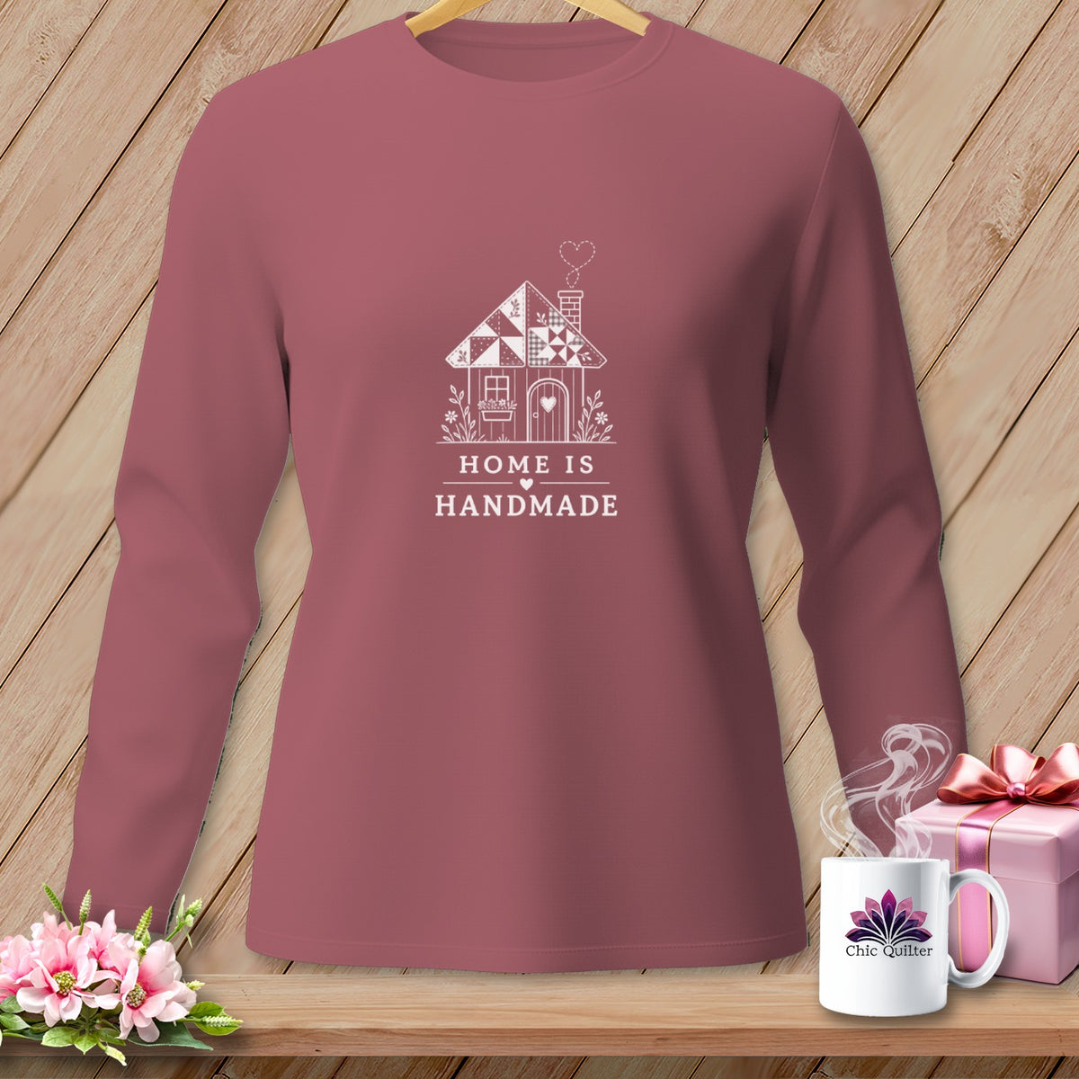 Maroon long-sleeve shirt with white "Home is Handmade" graphic and house design.