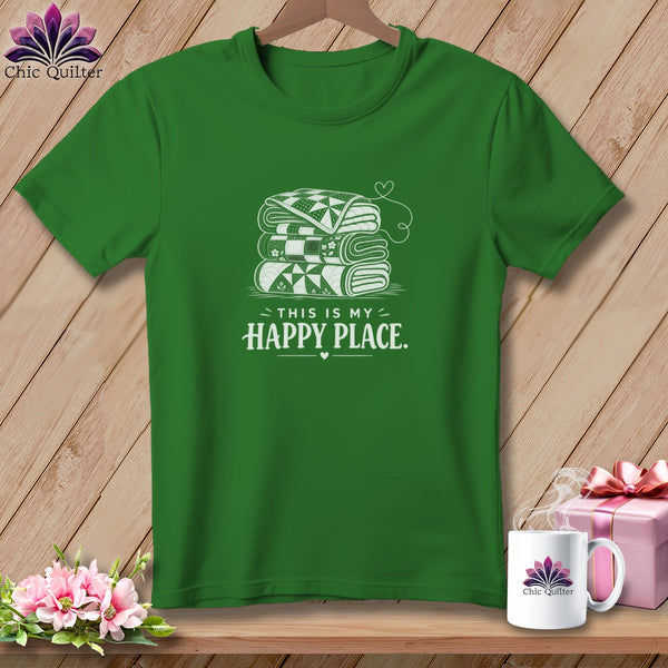 Green t-shirt with stacked quilts graphic and "This is my happy place" text.