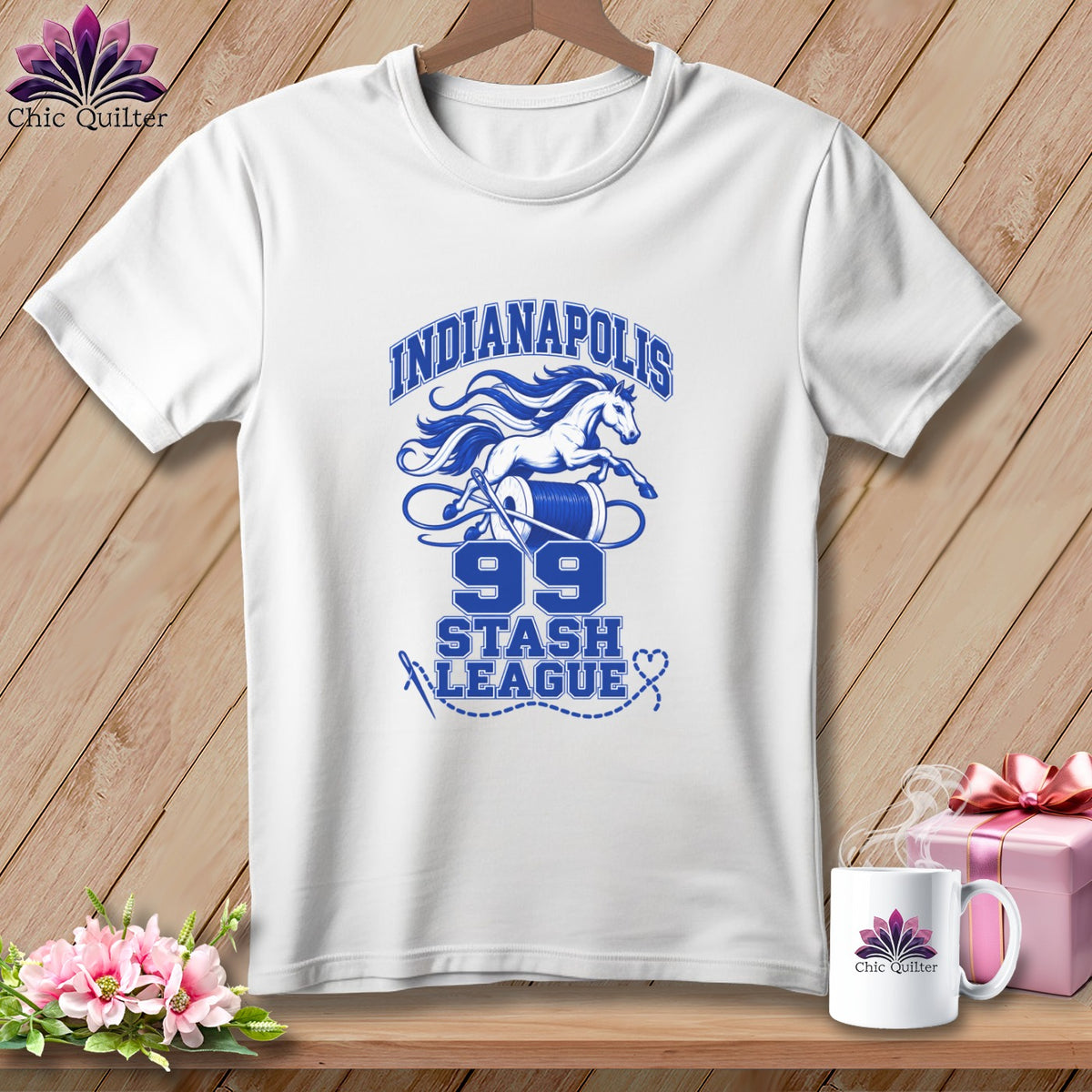 White crewneck t-shirt with blue graphic featuring a running horse, thread spool, and Indianapolis 99 Stash League text.