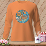 Orange long-sleeve shirt with a circular sewing machine, sun, and wave graphic.