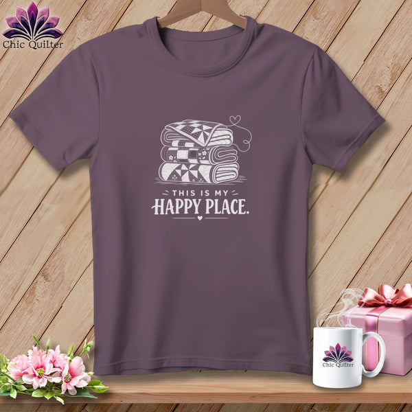 Purple t-shirt with stacked quilts design and text "THIS IS MY HAPPY PLACE."