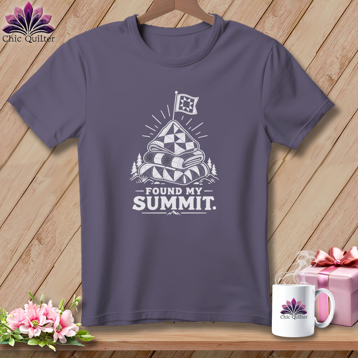 Purple t-shirt with "Found My Summit" text and quilt graphic.