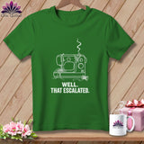 Green t-shirt with white outline of a broken sewing machine and text 