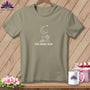 T-shirt with a white line drawing of a sewing machine, moon, stars, and "One More Row" text.