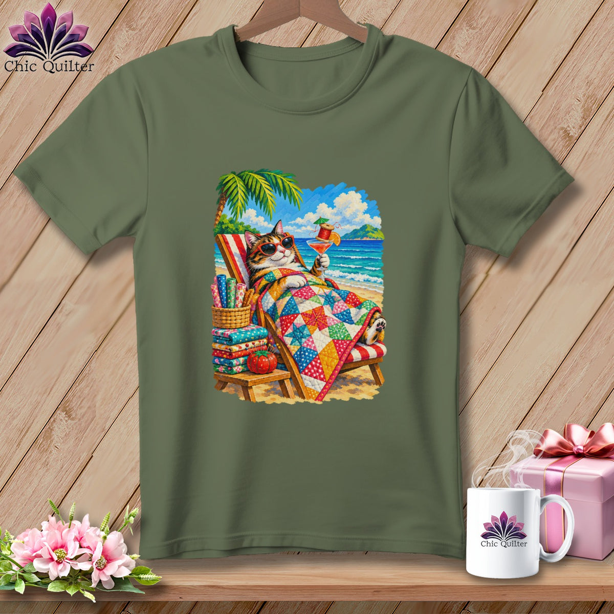 Olive green t-shirt featuring a graphic of a cat relaxing on a beach under a palm tree.