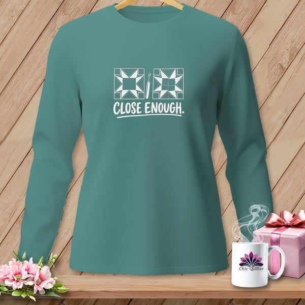 Teal long-sleeve shirt with quilting graphic and "CLOSE ENOUGH." text.