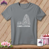 Grey t-shirt with a pile of fabric scraps and 