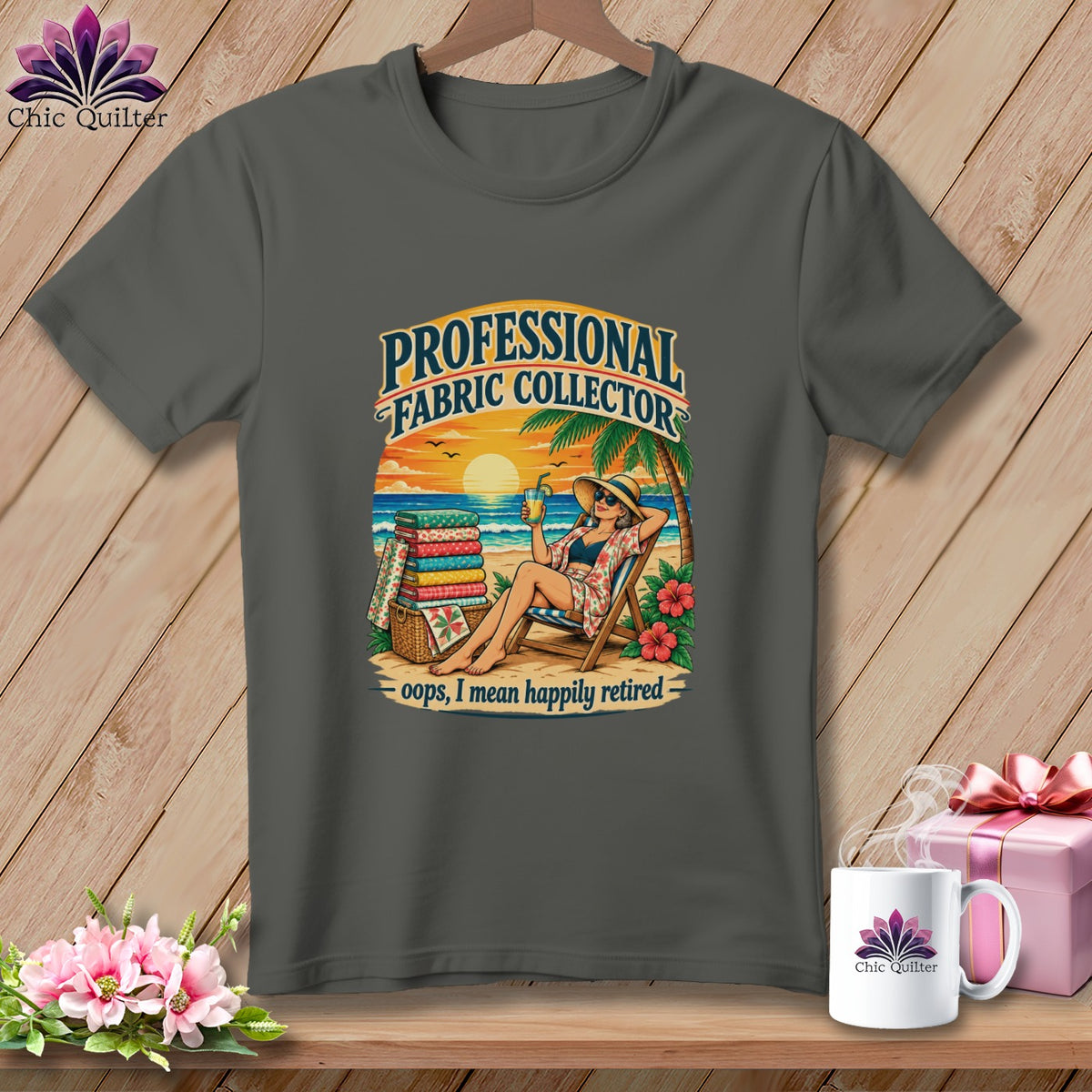 Dark gray t-shirt featuring a retro graphic of a woman relaxing on a beach with fabric.