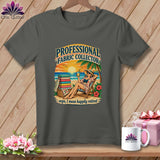 Dark gray t-shirt featuring a retro graphic of a woman relaxing on a beach with fabric.
