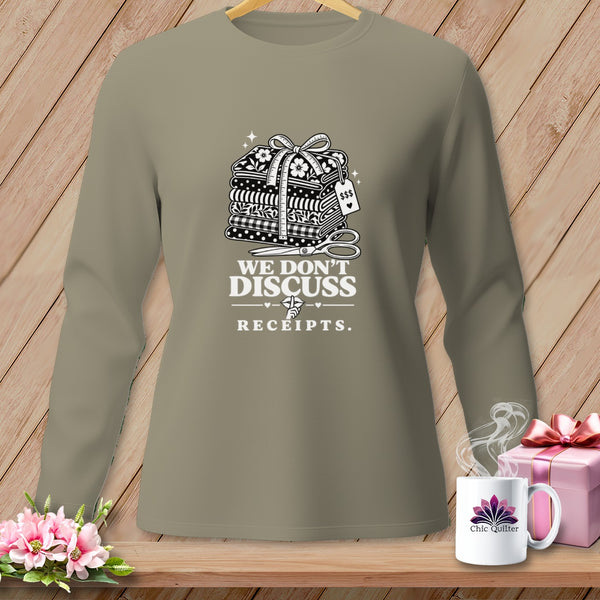 Long-sleeve shirt with stacked fabric and "We Don't Discuss Receipts" text.