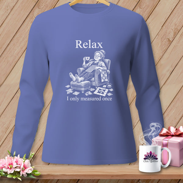 Purple long-sleeve shirt with graphic "Relax I only measured once" and sewing imagery.