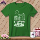 Green t-shirt with sewing machine, fabric stack, and 
