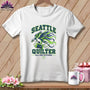 White t-shirt featuring a Seattle Quilter design with an eagle, spool of thread, and text.