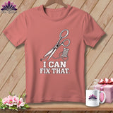 Pink t-shirt with scissors, thread, and text 