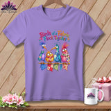 Purple t-shirt with graphic of four colorful cartoon birds and the text Birds of a Fabric Flock Together.