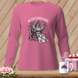 Pink long-sleeved shirt with a chicken sewing a quilt, text 