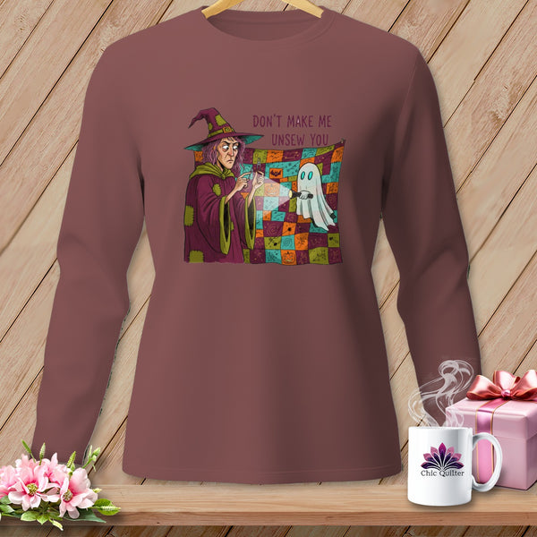Brown long-sleeve shirt with a witch and ghost graphic that says "Don't Make Me Unsew You".